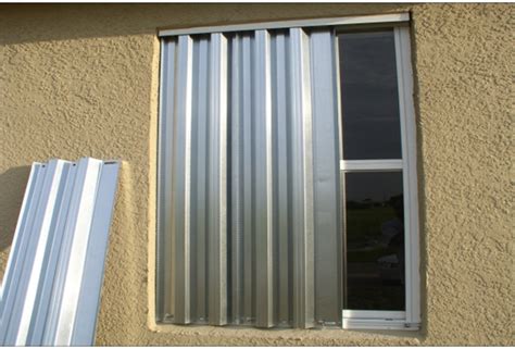 house up windows hurracan metal shelter|metal hurricane shutter panels.